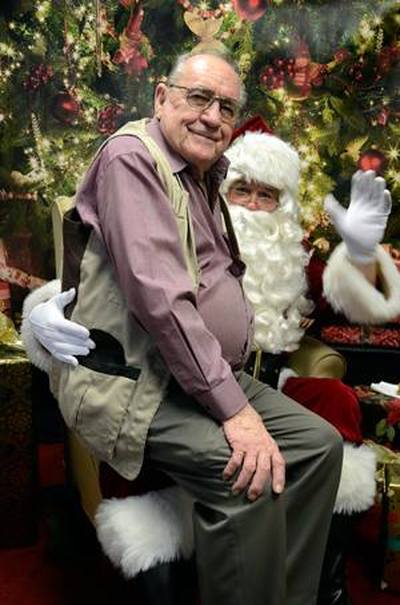 Jim Rounsavell with Santa